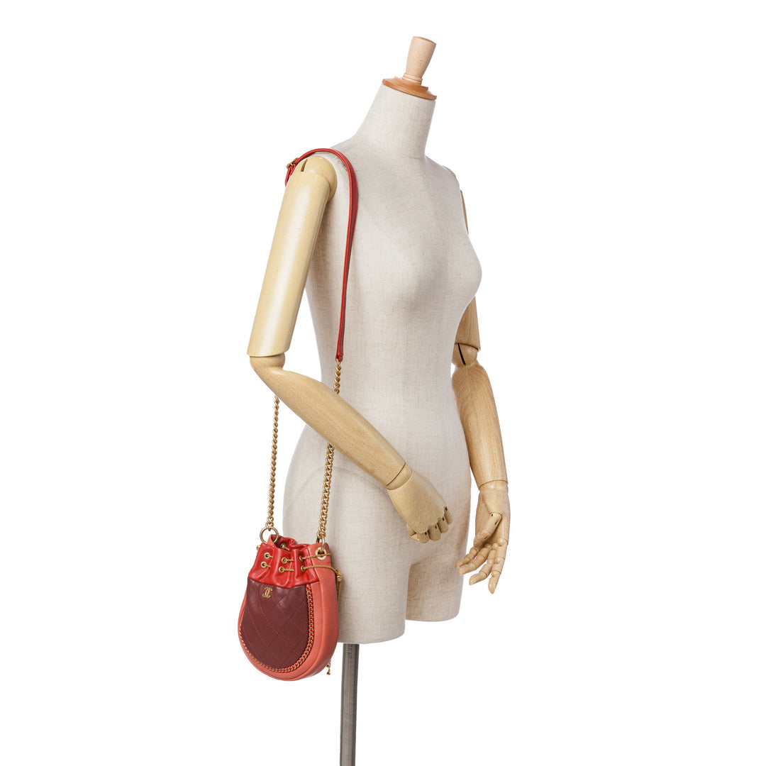 CC Quilted Calfskin Drawstring Bucket Bag Red - Gaby Paris