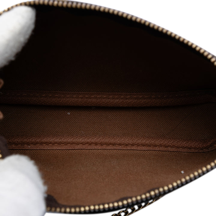 Louis Vuitton Pochette Accessoires Mini Monogram Marron – vue 4 – GABY PARIS