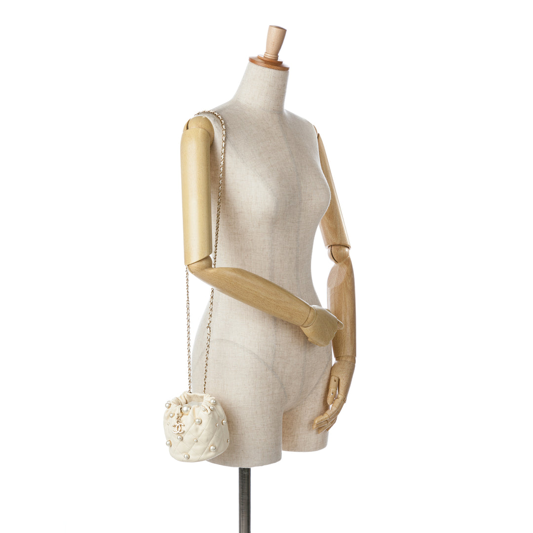 Mini Quilted Lambskin About Pearls Drawstring Bucket Bag White - Gaby Paris