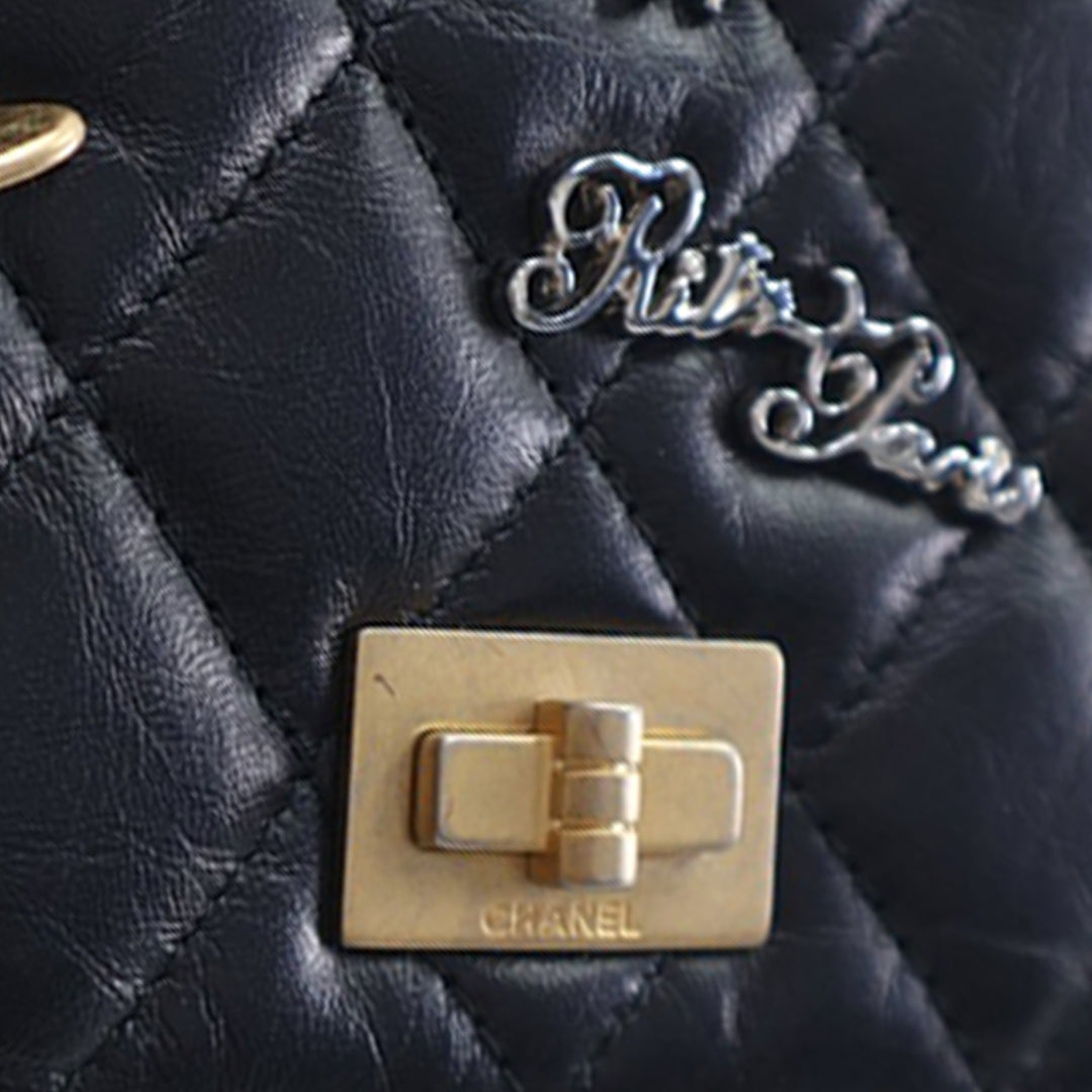 Chanel Matelassé vieilli Cuir de veau Reissue 2.55 Lucky Charms Wallet on Chain