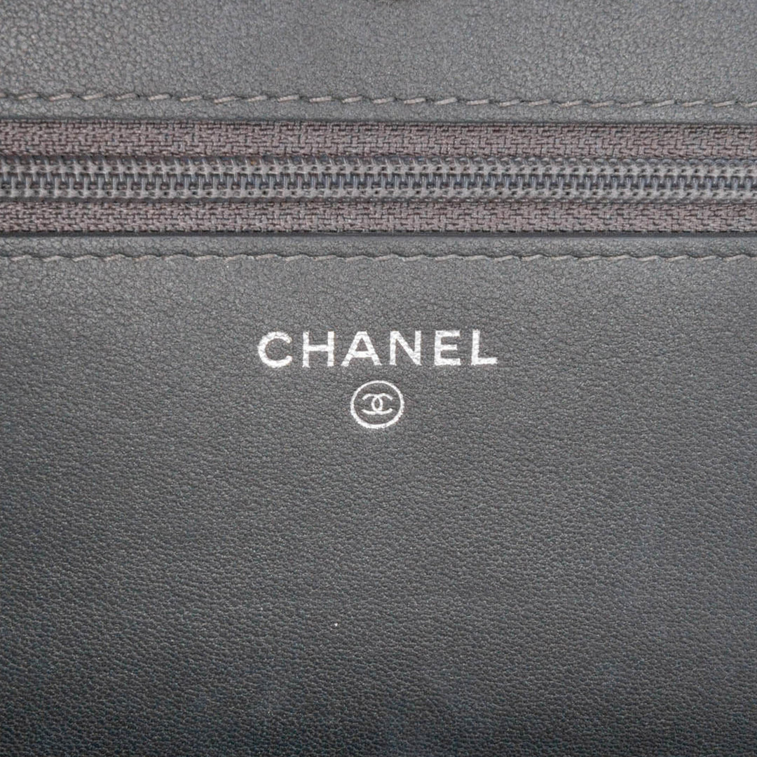 Chanel CC clouté Camellia Wallet on Chain Cuir d'agneau