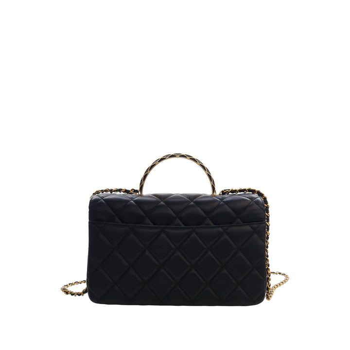 Chanel CC Matelassé Cuir d’agneau Metal Twist anse supérieure à rabat