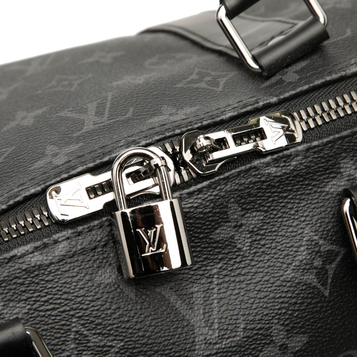 Louis Vuitton Monogram Eclipse Keepall Bandouliere 55 Noir – GABY PARIS Authentique