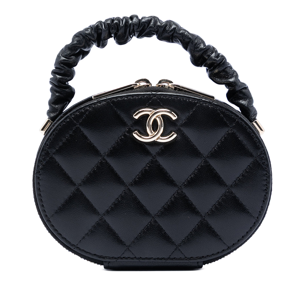 Chanel CC Matelassé Cuir d’agneau Oval anse supérieure Pochette