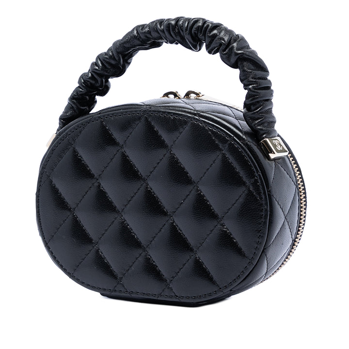 Chanel CC Matelassé Cuir d’agneau Oval anse supérieure Pochette
