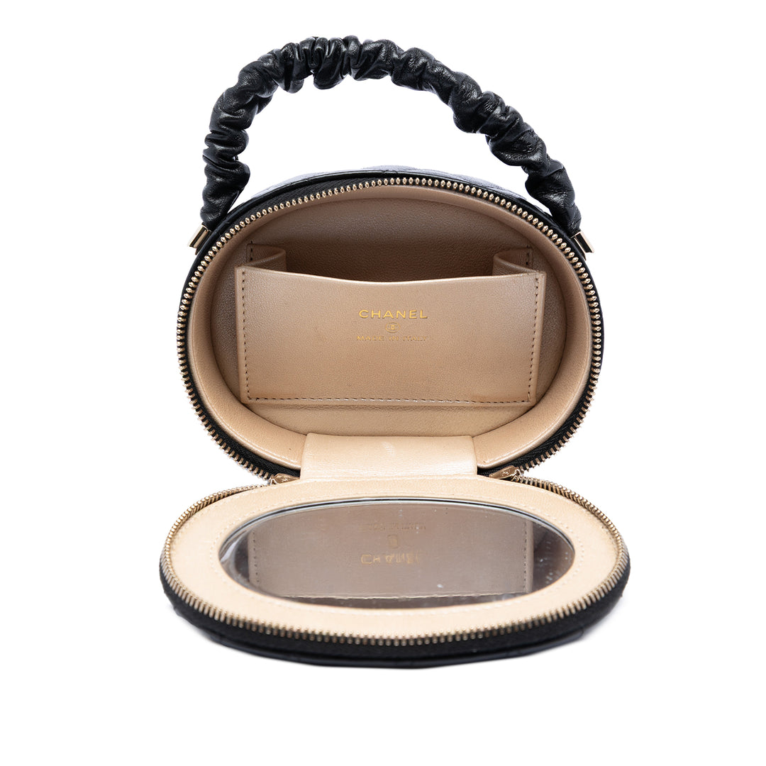 Chanel CC Matelassé Cuir d’agneau Oval anse supérieure Pochette