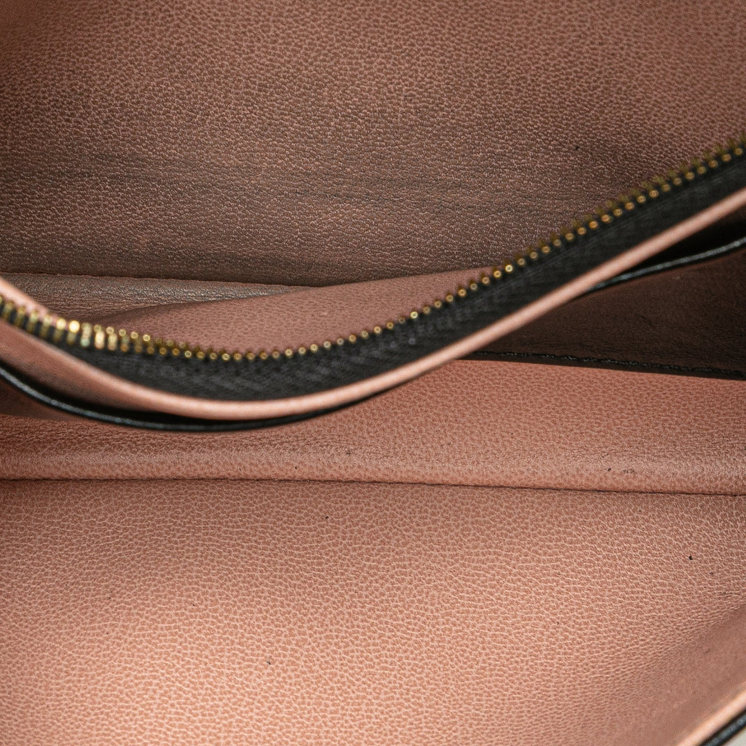 Louis Vuitton Monogram embossé Pochette Coussin
