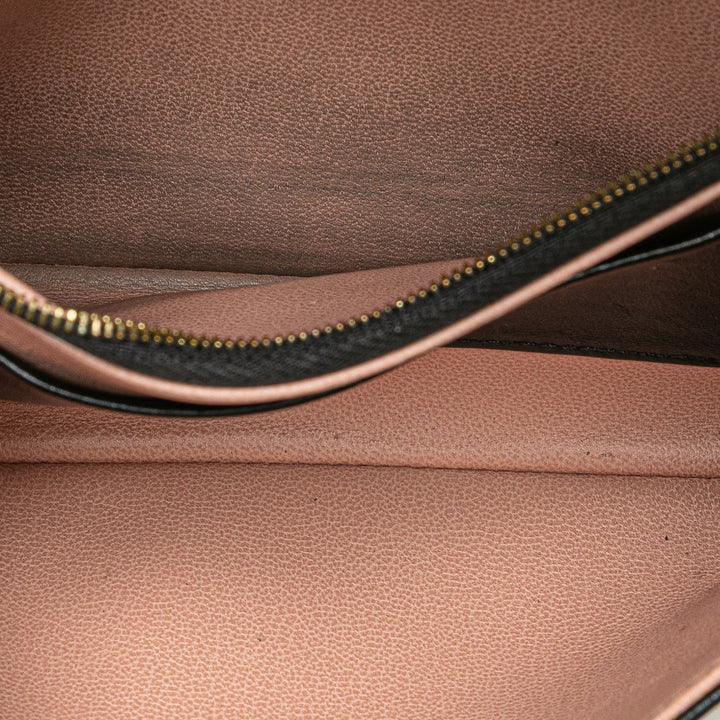 Louis Vuitton Monogram embossé Pochette Coussin