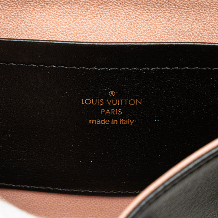 Louis Vuitton Monogram embossé Pochette Coussin