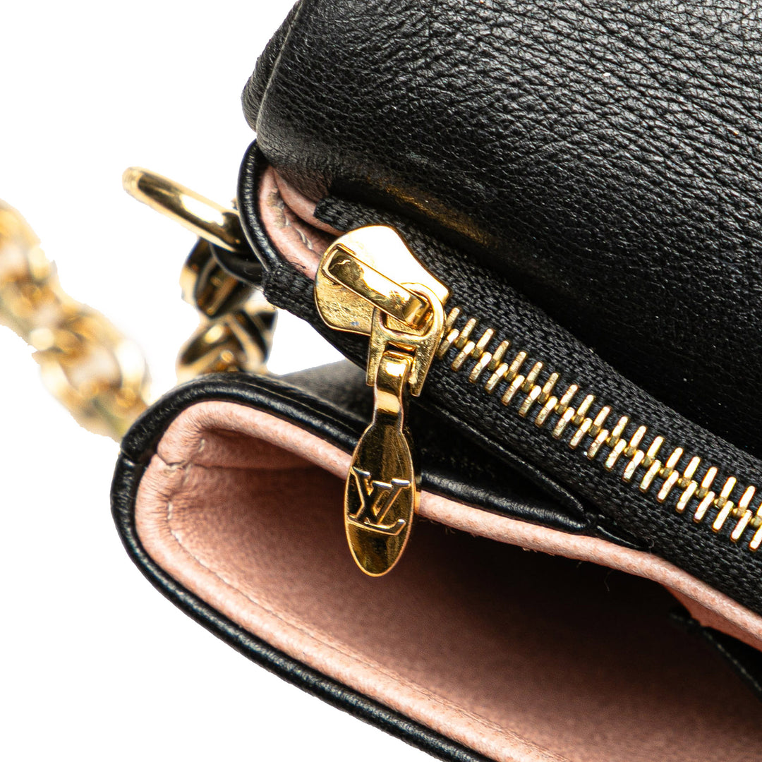 Louis Vuitton Monogram embossé Pochette Coussin