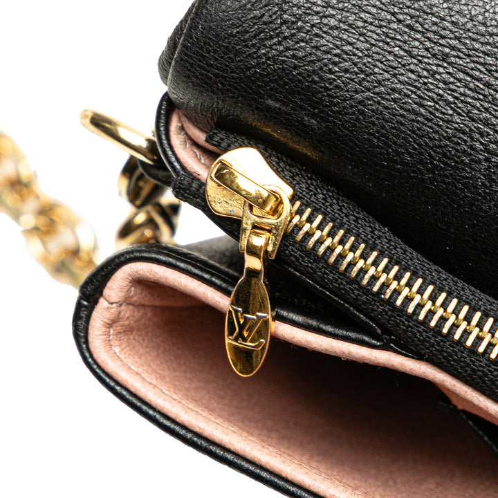 Louis Vuitton Monogram embossé Pochette Coussin
