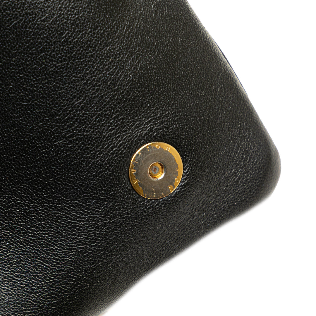 Louis Vuitton Monogram embossé Pochette Coussin