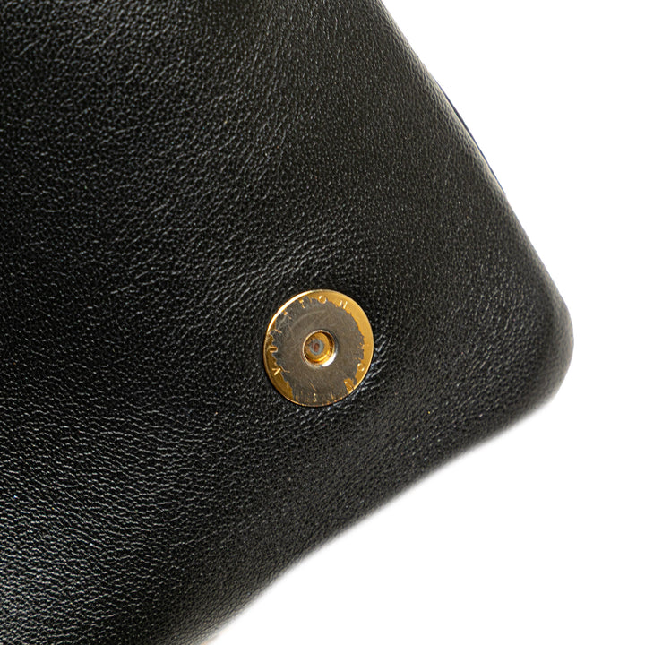 Louis Vuitton Monogram embossé Pochette Coussin