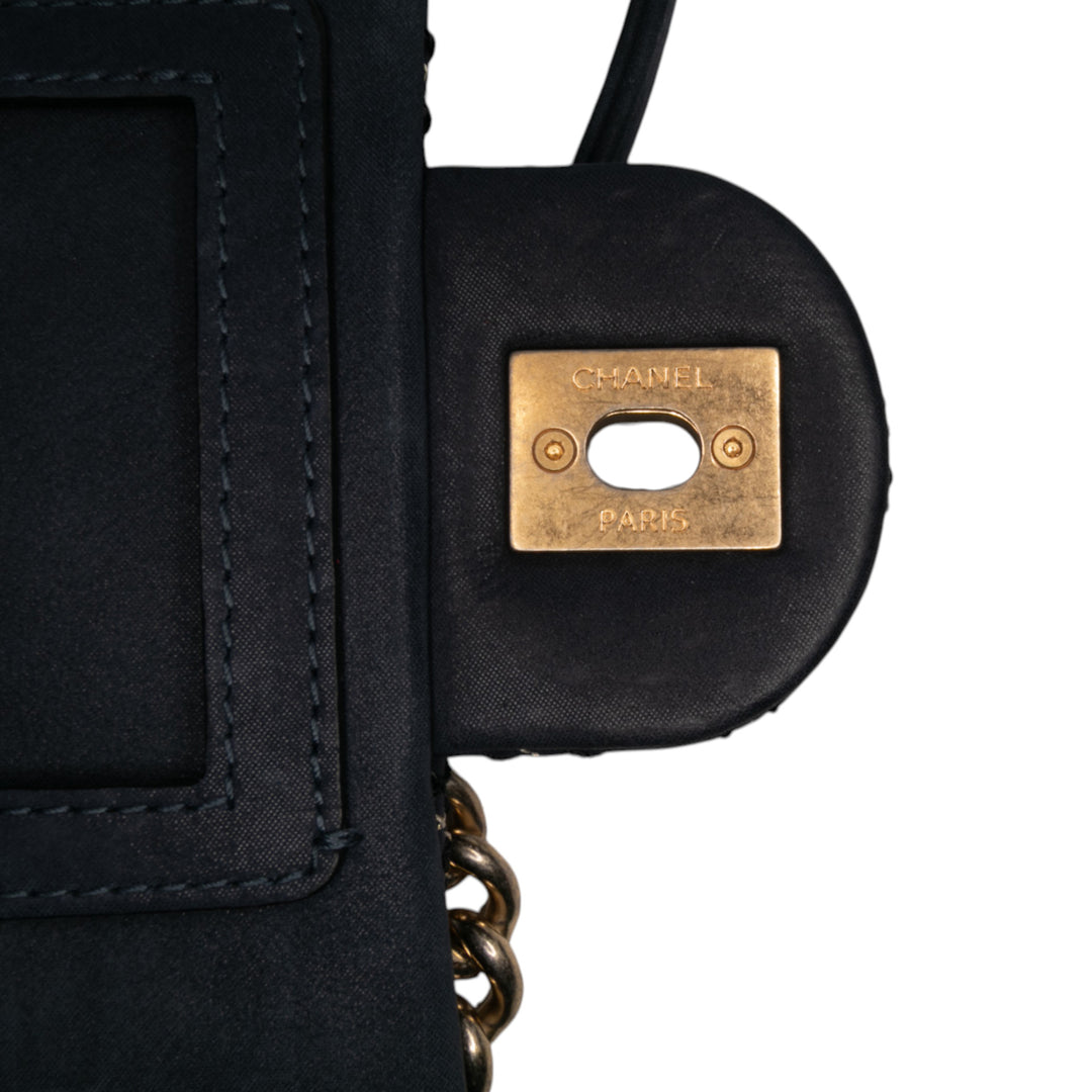 Chanel Medium Matelassé Cuir de veau Triple Surpiqué à rabat