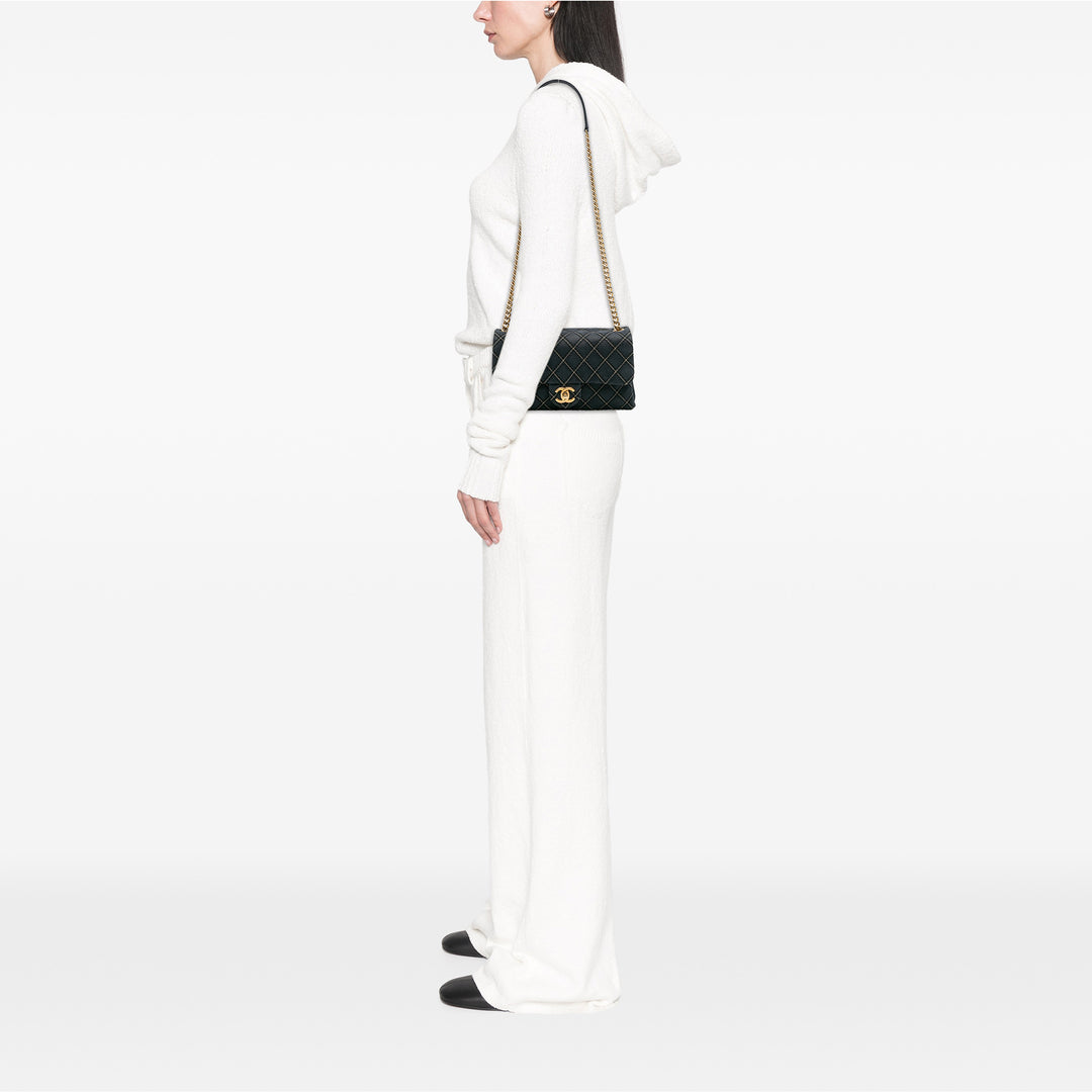 Chanel Medium Matelassé Cuir de veau Triple Surpiqué à rabat