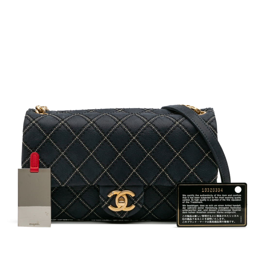 Chanel Medium Matelassé Cuir de veau Triple Surpiqué à rabat