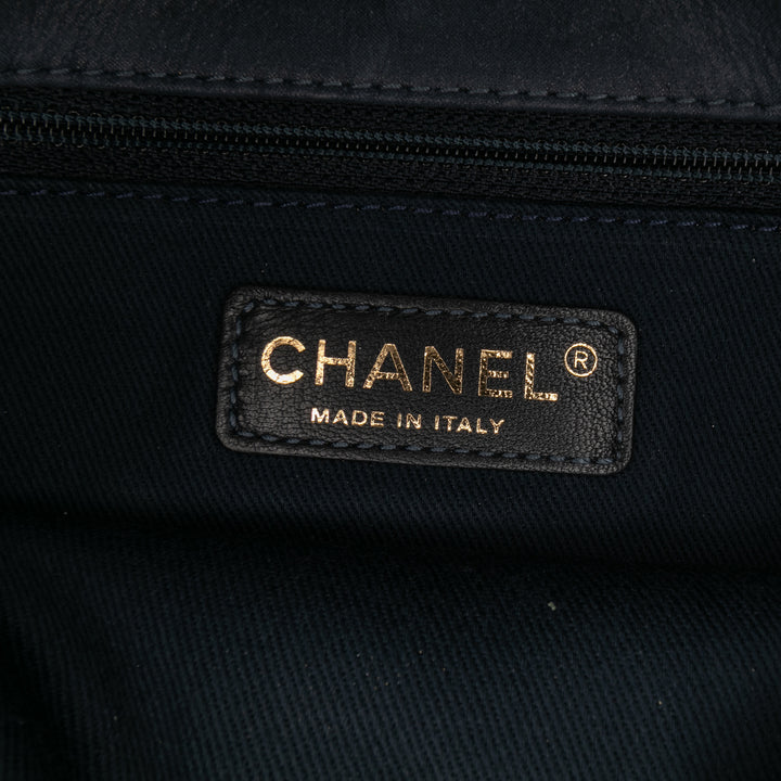 Chanel Medium Matelassé Cuir de veau Triple Surpiqué à rabat
