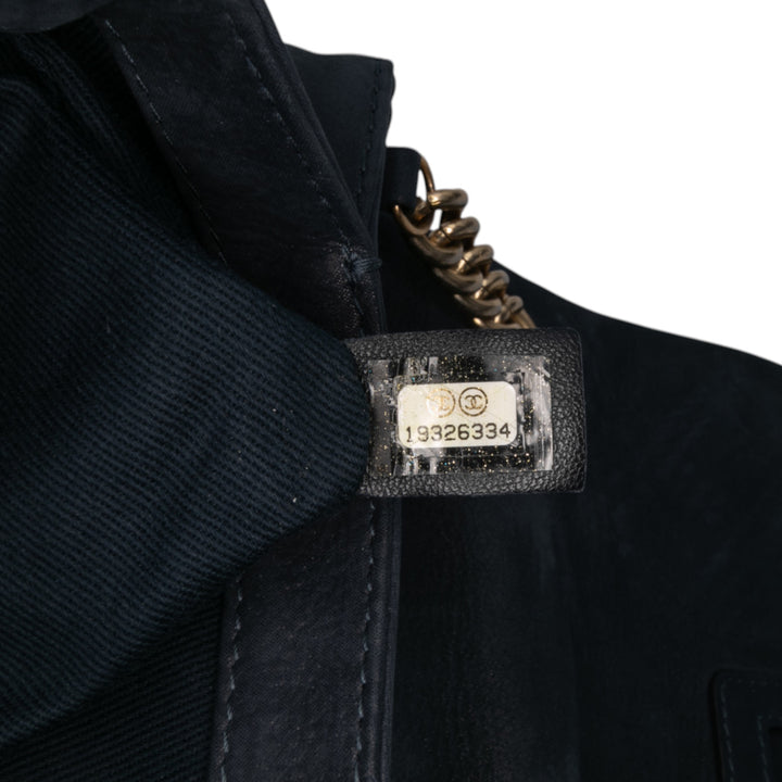 Chanel Medium Matelassé Cuir de veau Triple Surpiqué à rabat