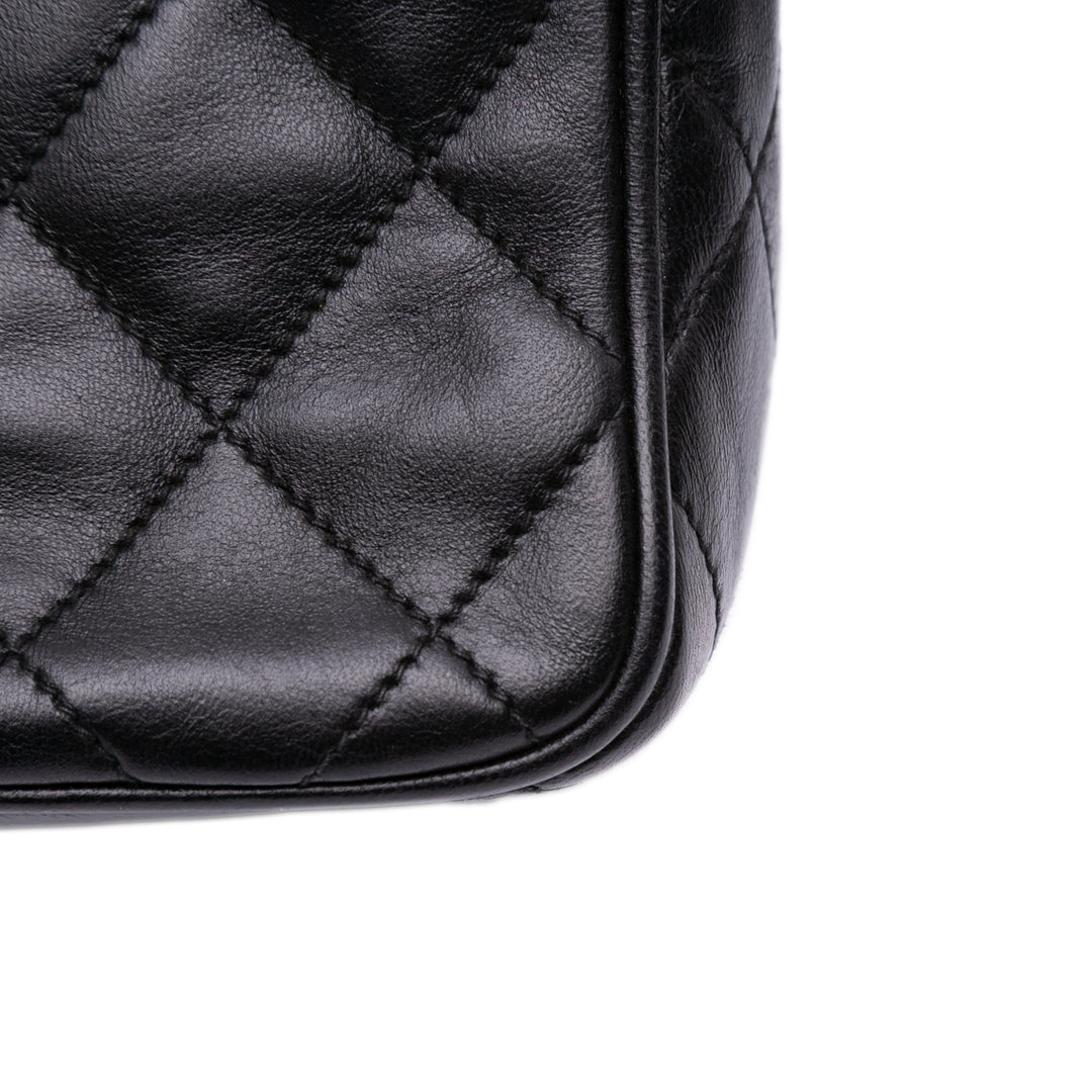Chanel Mini Quilted Cuir d’agneau Camera Sac porté croisé Noir