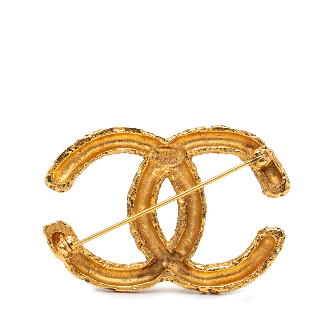 Chanel CC plaqué Baroque embossé Broche Métal