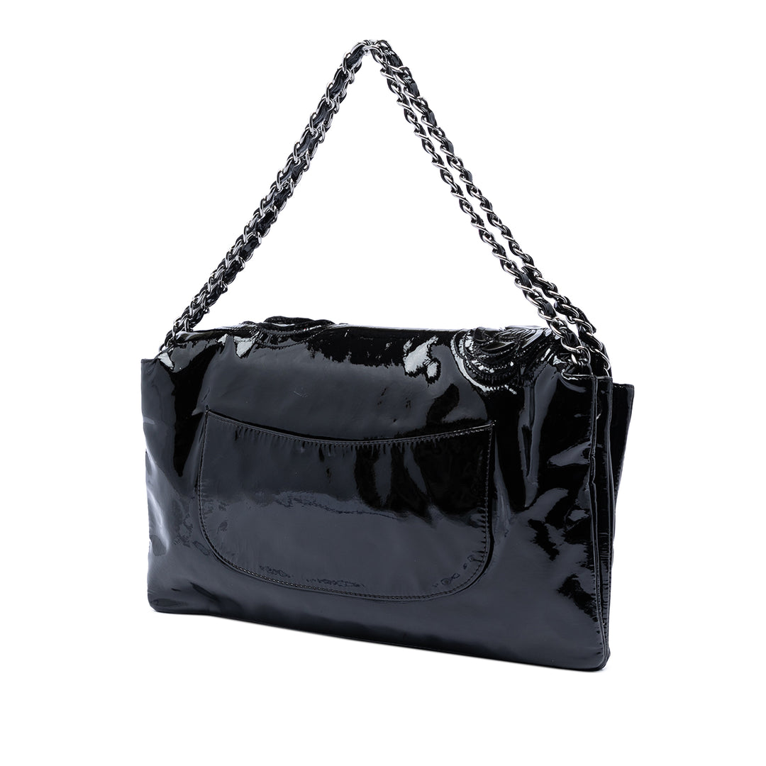 Chanel Cuir verni Camellia à rabat Sac