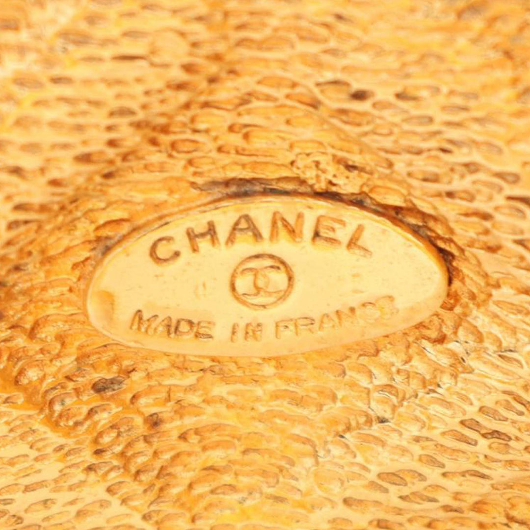 Chanel CC plaqué Matelassé Wide Cuff Bracelet