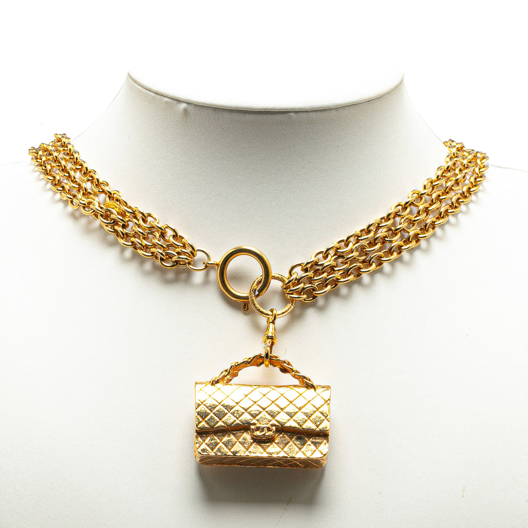 Gold Plated Multi Chain Flap Bag Pendant Necklace Gold - Gaby Paris