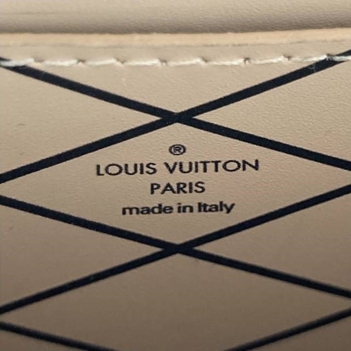 Louis Vuitton Pochette Trunk Verticale Monogram Marron