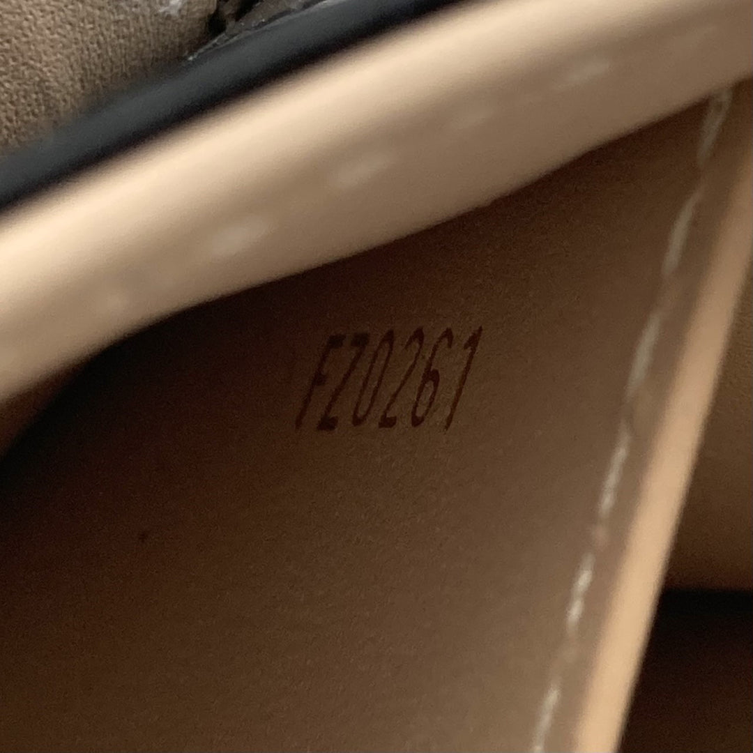 Louis Vuitton Pochette Trunk Verticale Monogram Marron