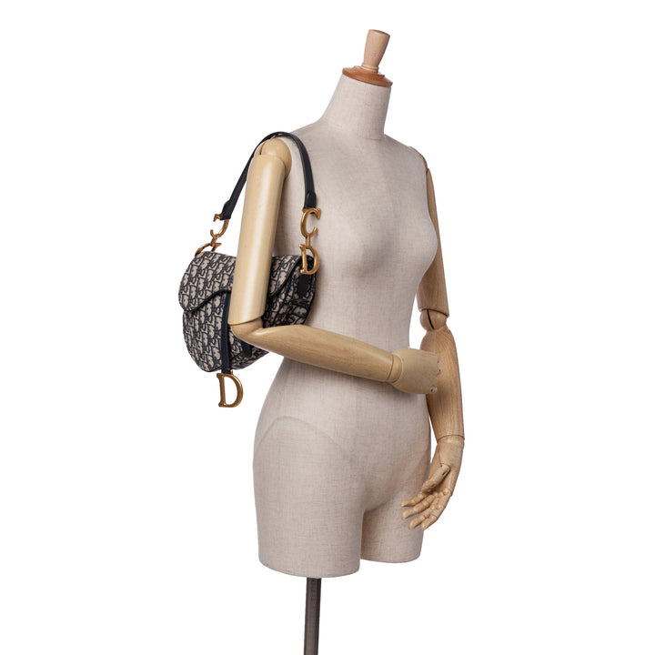 Oblique Canvas Saddle Bag Blue - Gaby Paris