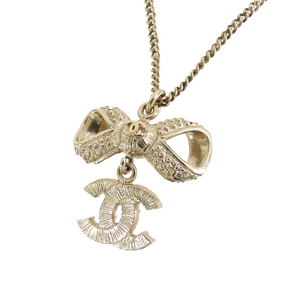 Gold Plated CC Bow Crystal Pendant Necklace Gold - Gaby Paris