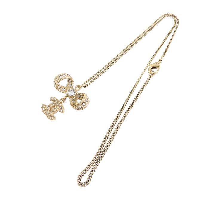 Gold Plated CC Bow Crystal Pendant Necklace Gold - Gaby Paris