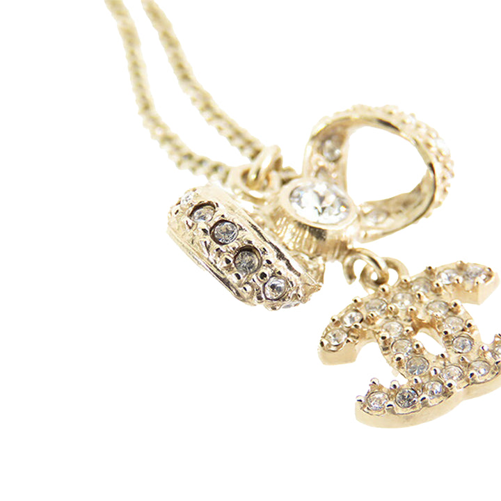 Gold Plated CC Bow Crystal Pendant Necklace Gold - Gaby Paris