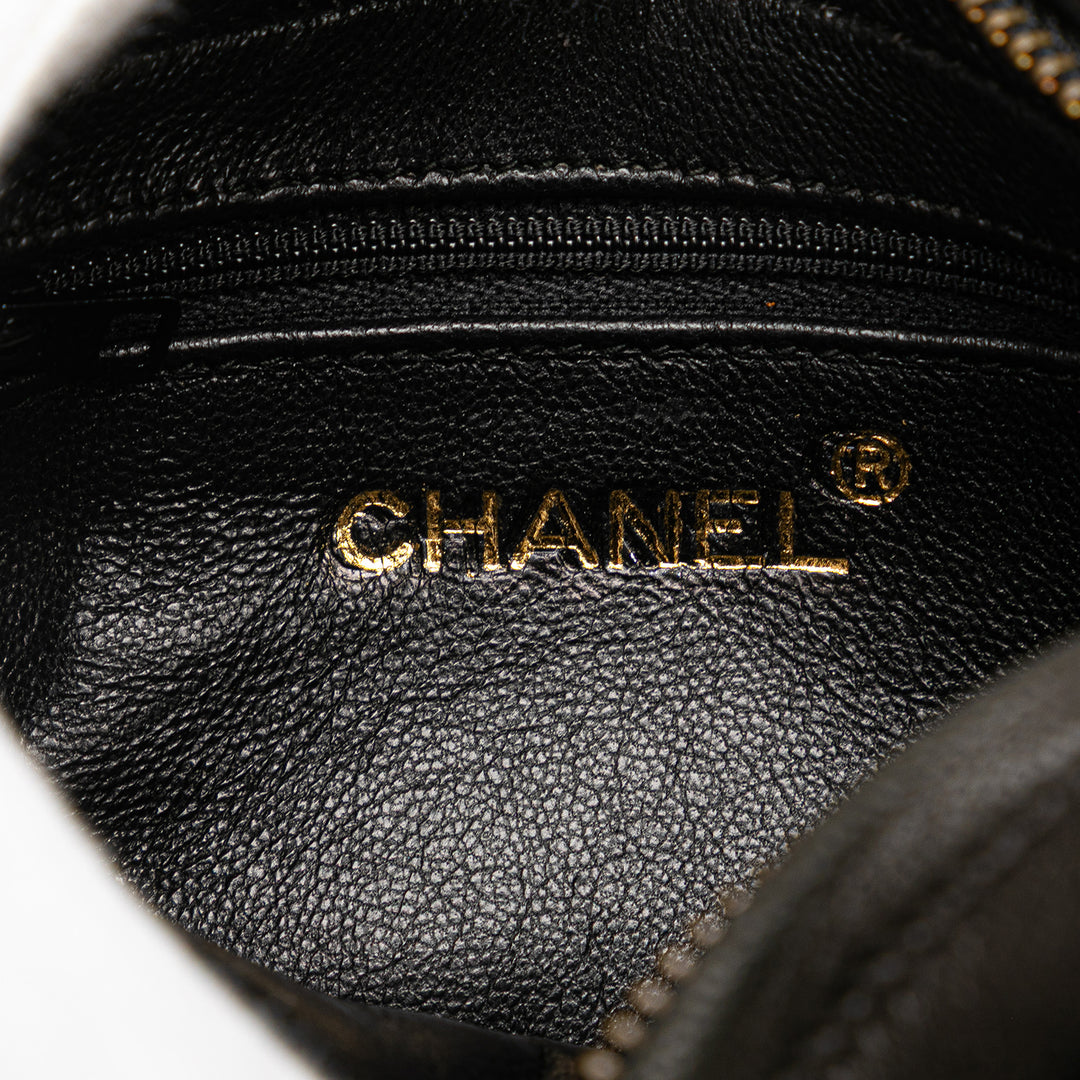 Chanel Quilted Cuir d’agneau Tassel Pochette Noir
