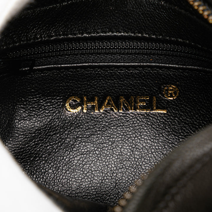 Chanel Quilted Cuir d’agneau Tassel Pochette Noir