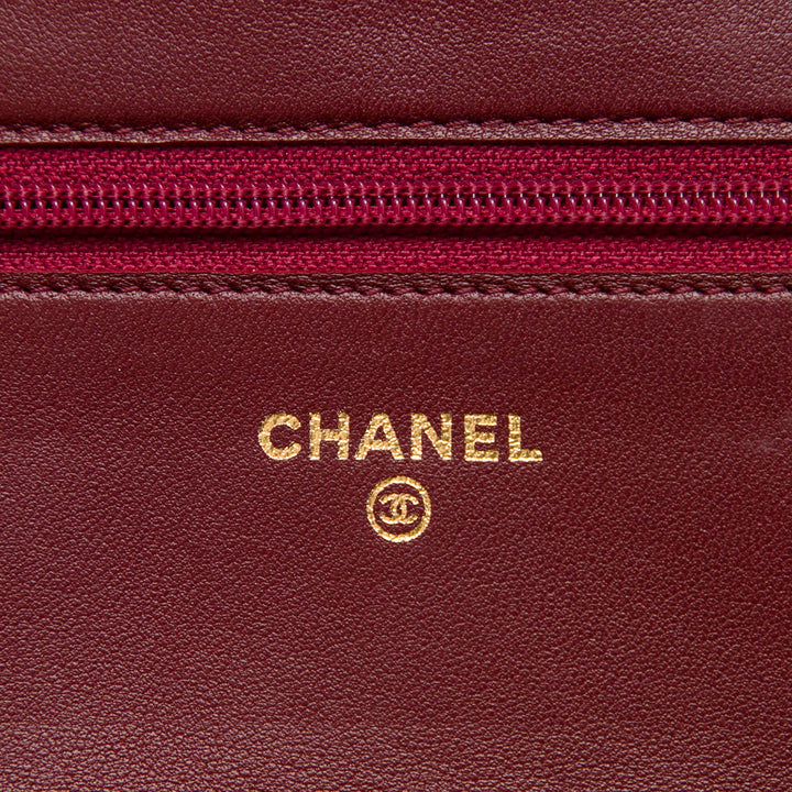 Chanel CC embossé Camellia Wallet on Chain Cuir de veau