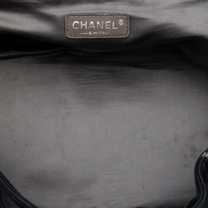 Chanel Matelassé Cuir d’agneau East West Mademoiselle Accordion à rabat