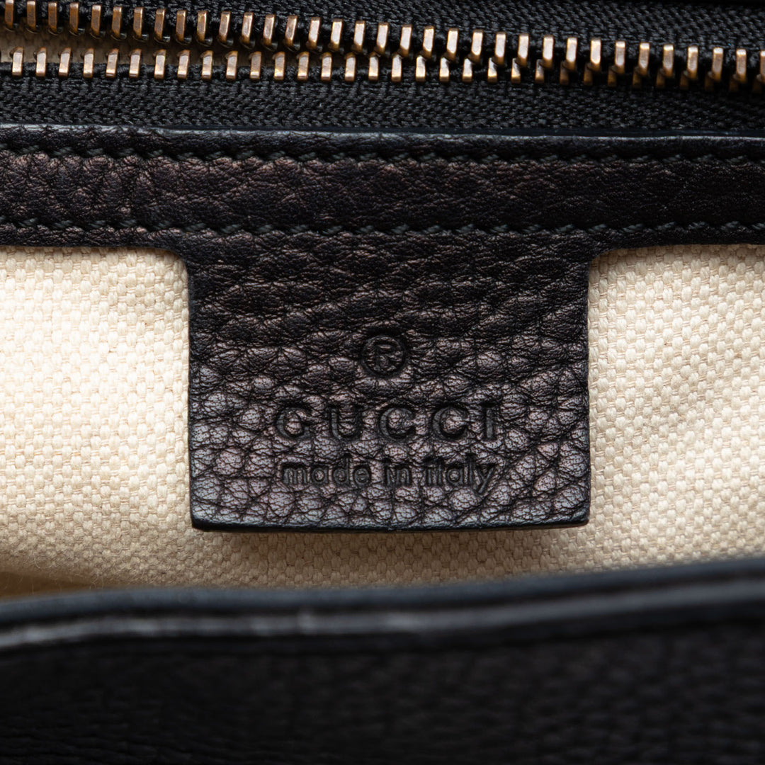 GG Marmont grainé sac à Petit Cuir de veau grainé Noir