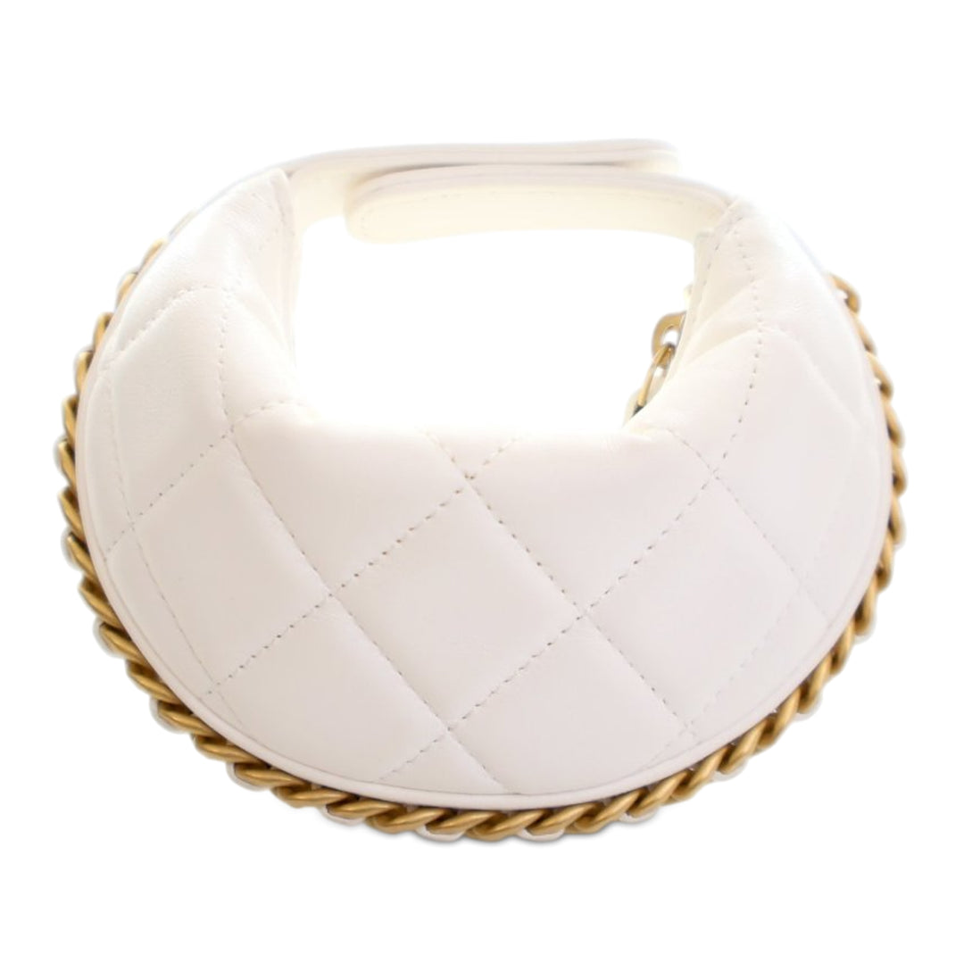 Chanel Mini brillant Crumpled Matelassé Cuir d’agneau Sac rond à chaîne Pochette