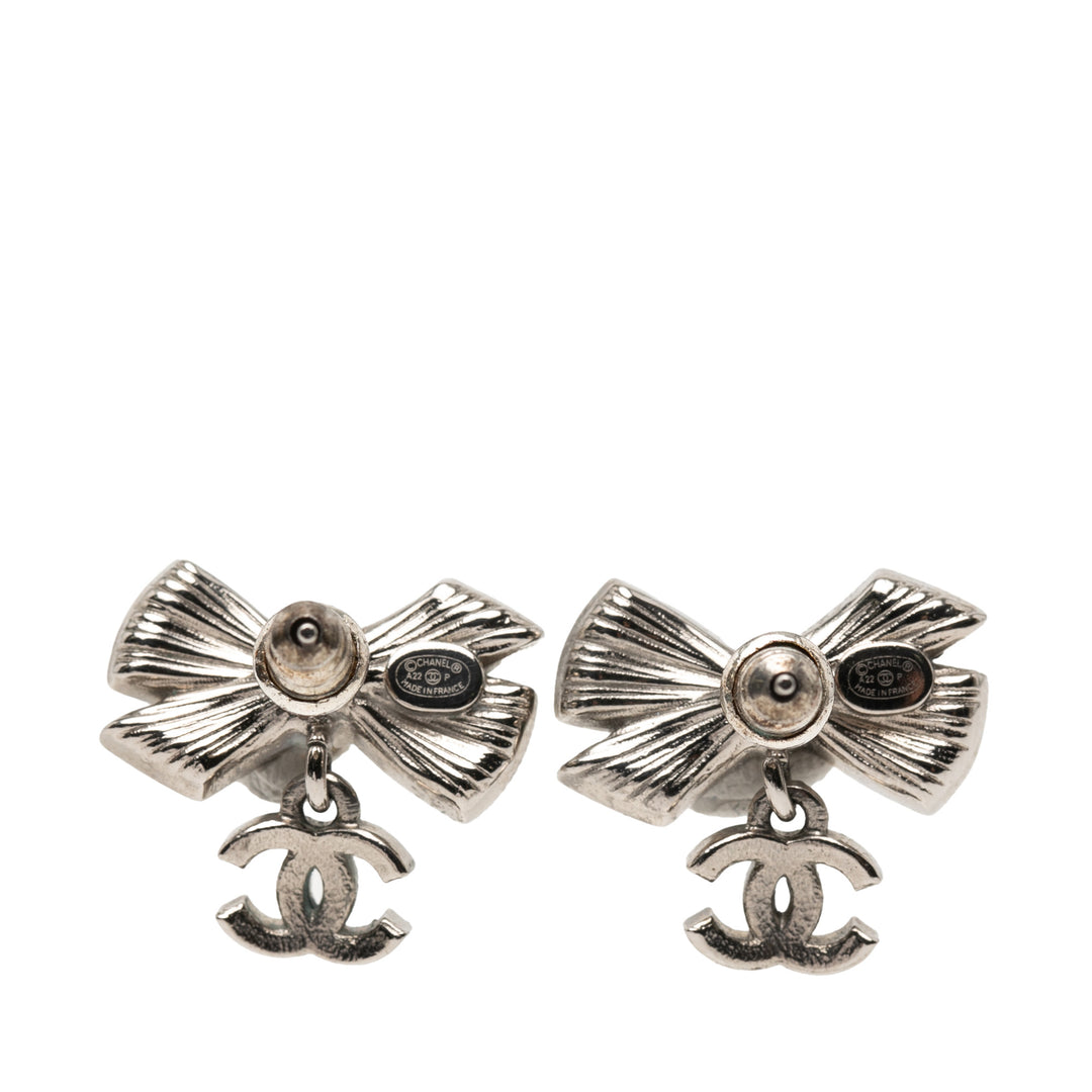 Chanel plaqué Perles fantaisie Cristal Bow CC pendantes fermoir poussette Boucles d’oreilles