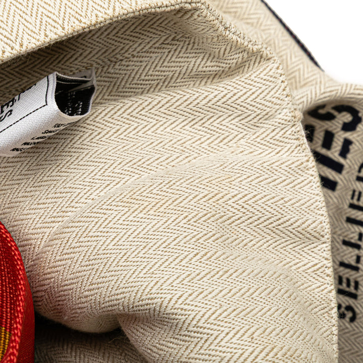 Toile Chevron Cavalier Sling Bag White - Gaby Paris