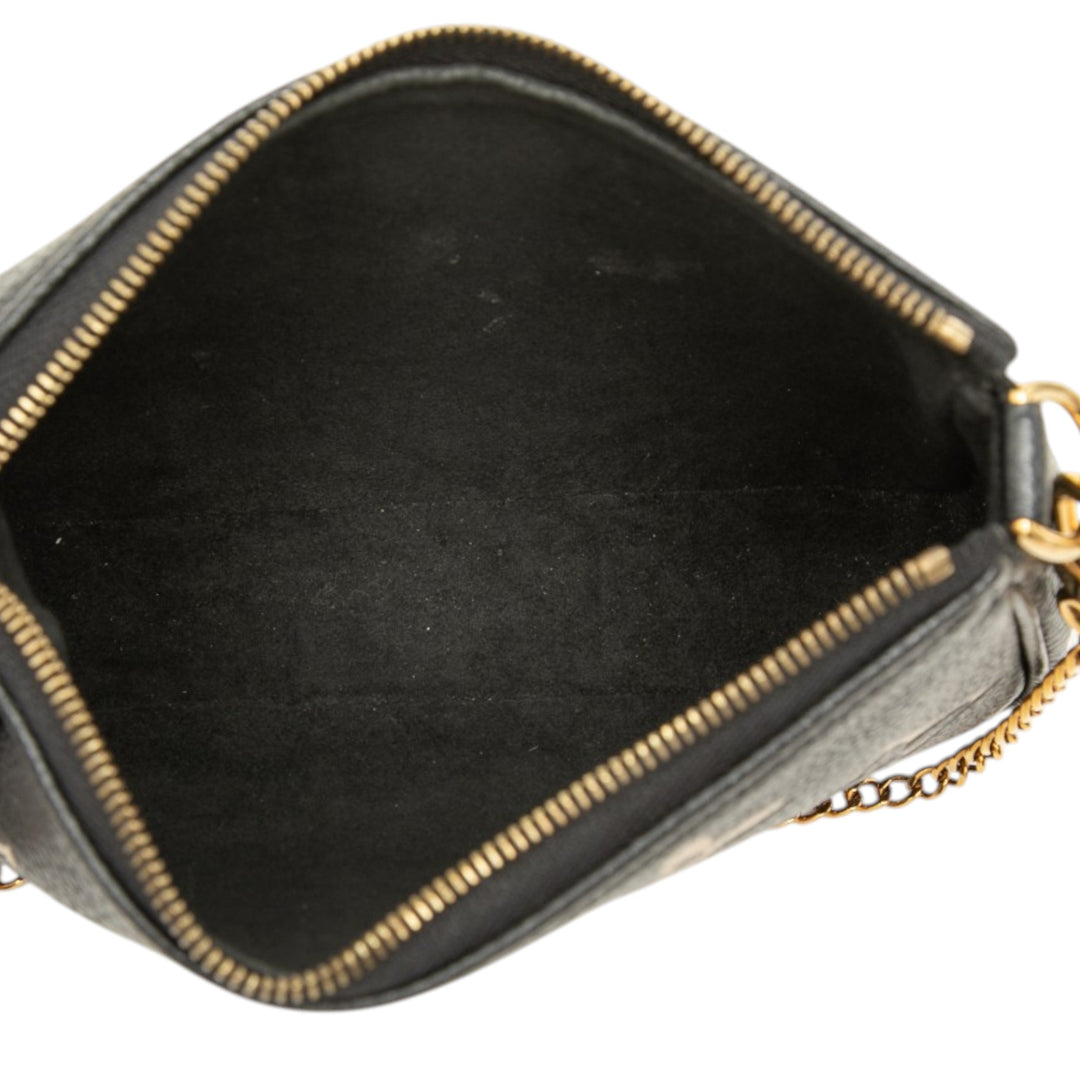 Louis Vuitton Bicolore Pochette Accessoires Mini Monogram Empreinte Noir – vue 4 – GABY PARIS