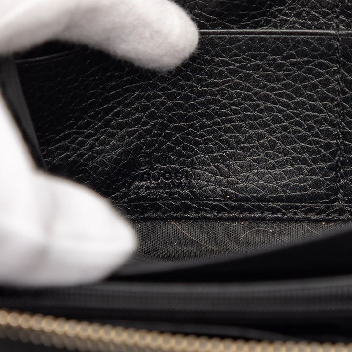 Gucci Cuir de veau grainé Soho Zip Around Portefeuille