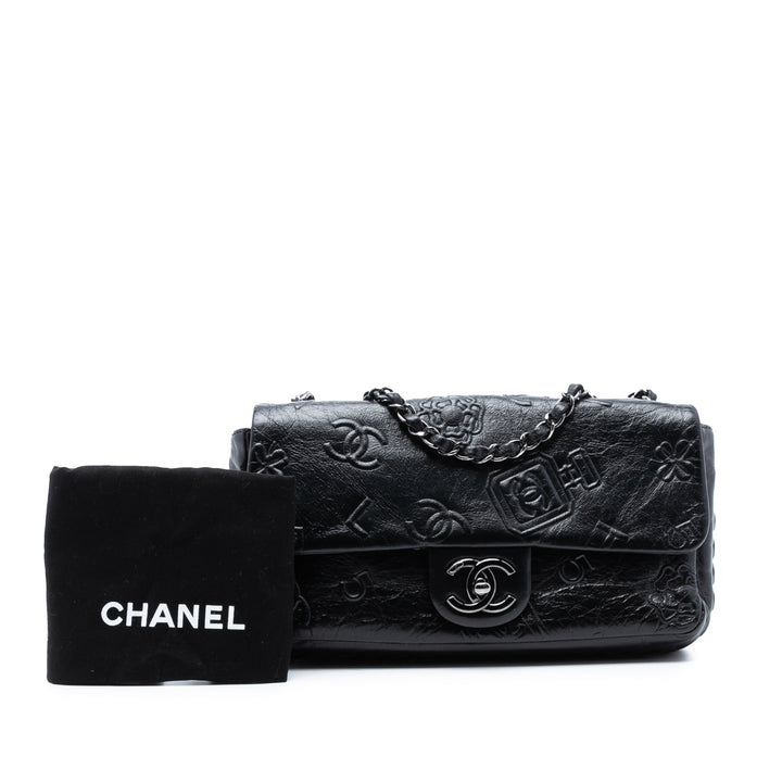 Chanel Medium embossé Cuir de veau Precious Symbols à rabat