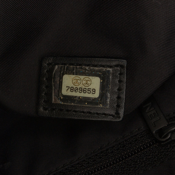 Chanel New Travel Line Nylon Sac à main Noir – GABY PARIS Authentique