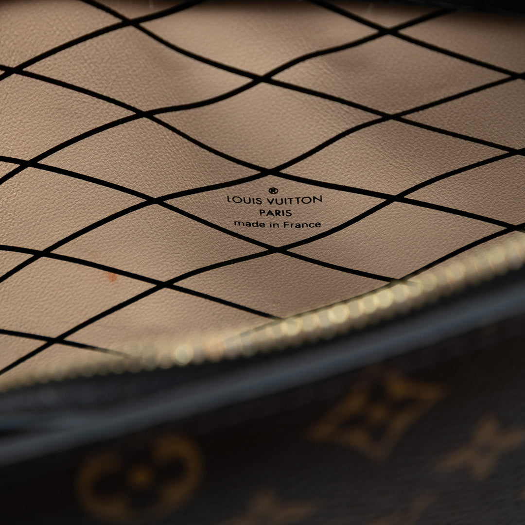 Louis Vuitton Monogram Reverse Trunk Pochette