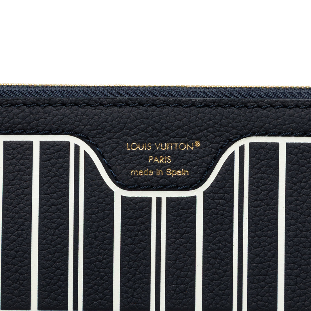 Louis Vuitton Pochette Neverfull Inside Out MM Cuir de veau Bleu – vue 5 – GABY PARIS