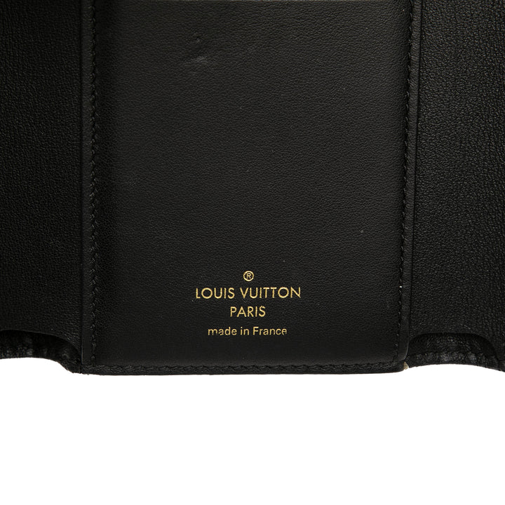Louis Vuitton clouté Taurillon Capucines Compact Portefeuille