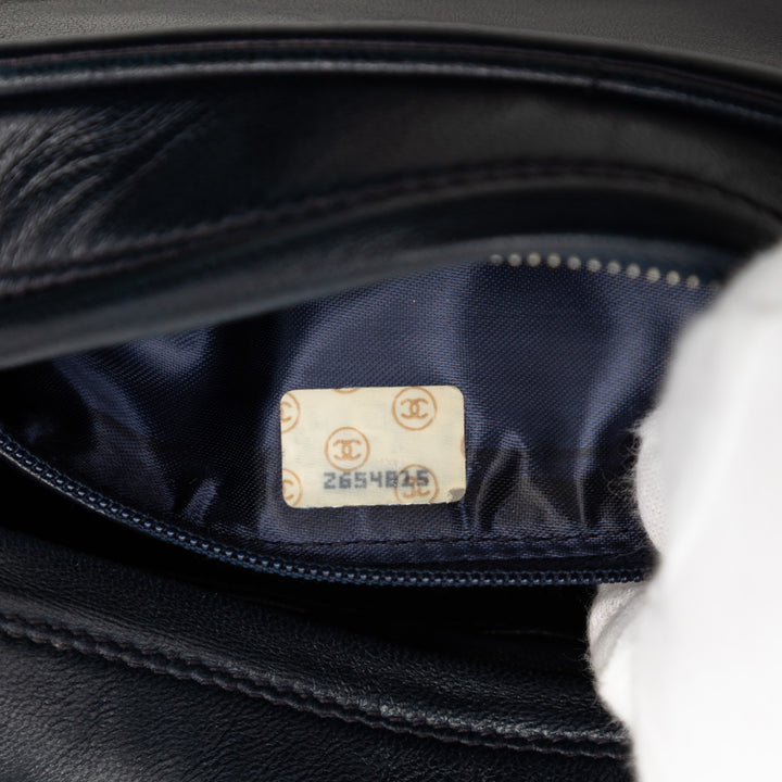 Chanel CC Cuir d’agneau Border Pompon Chain Sac caméra