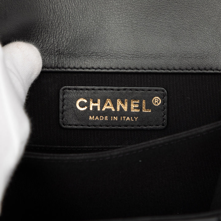 Chanel Matelassé Cuir d'agneau North South Boy à rabat